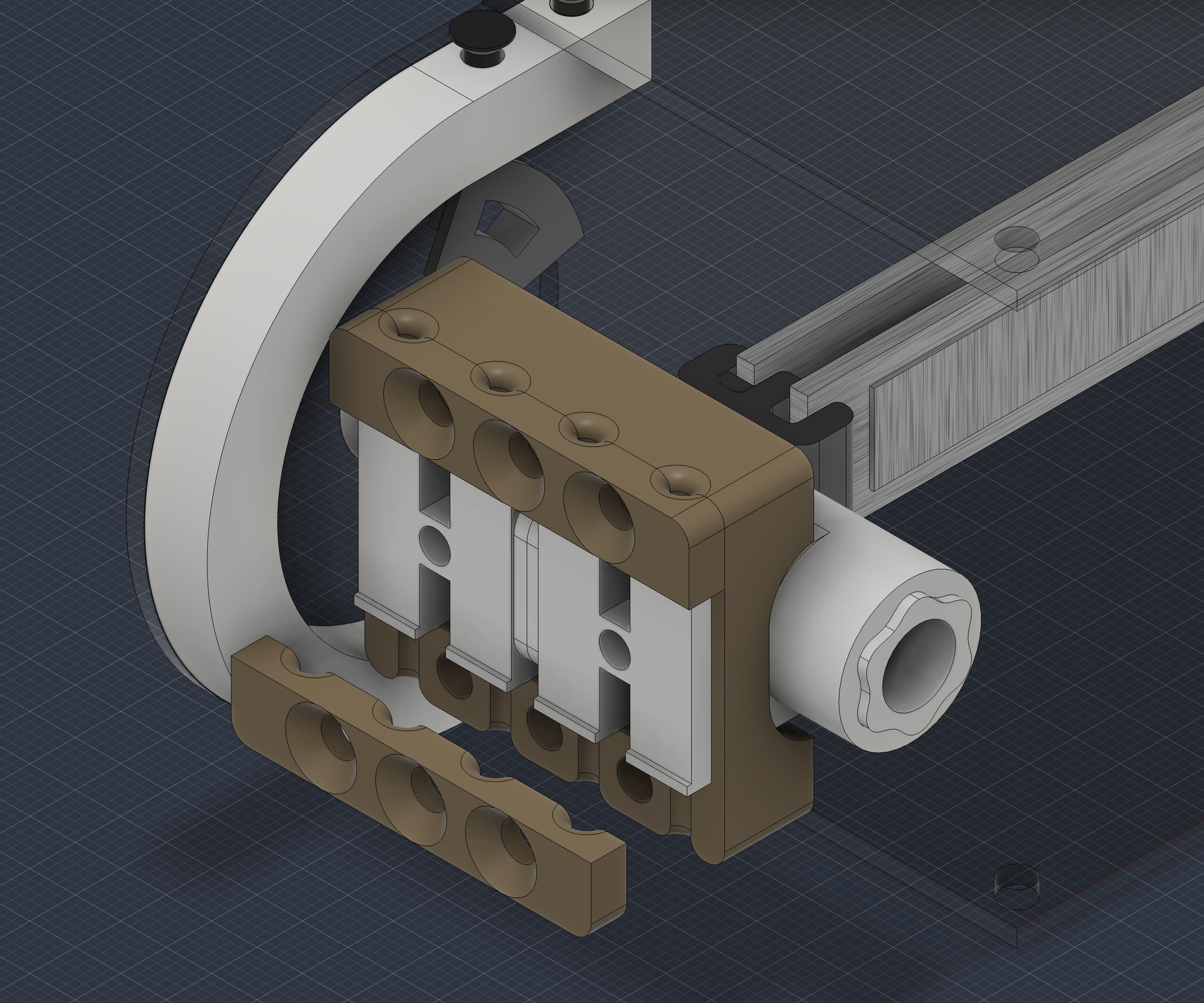 The clamp I designed is this brown part