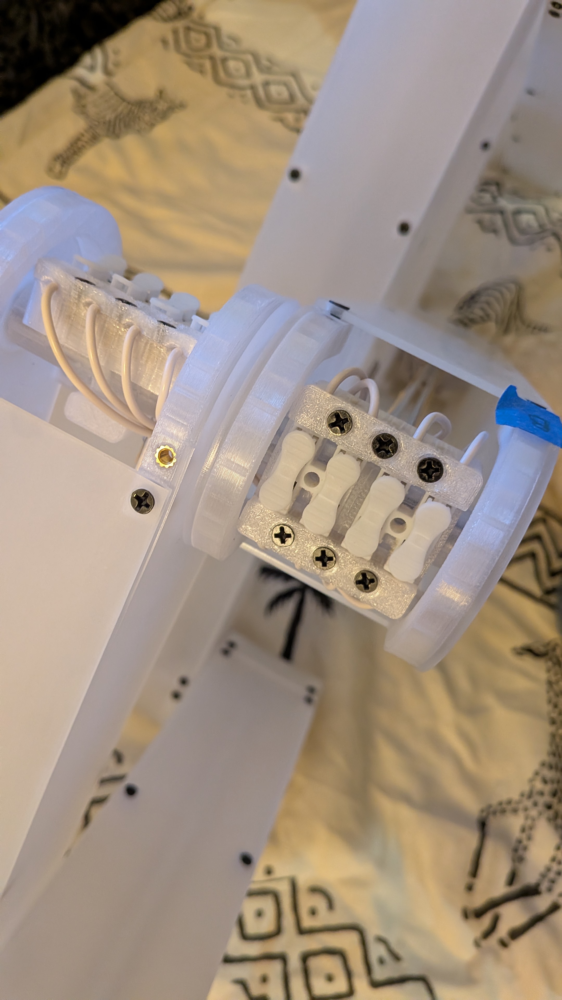 The clamp in place, holding the wire