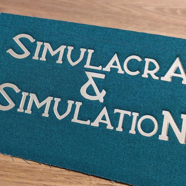 With embossing. Quite hard to have a perfect alignment